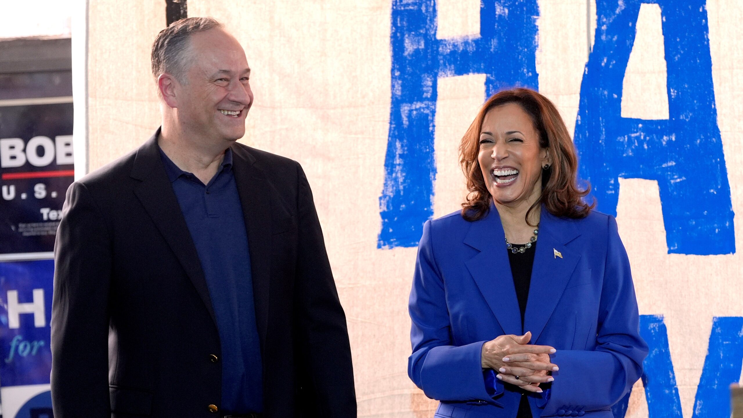 Democratic presidential nominee Vice President Kamala Harris, right, and second gentleman Doug Emhoff attend a campaign event, Sunday, Aug. 18, 2024, in Rochester, Pa.